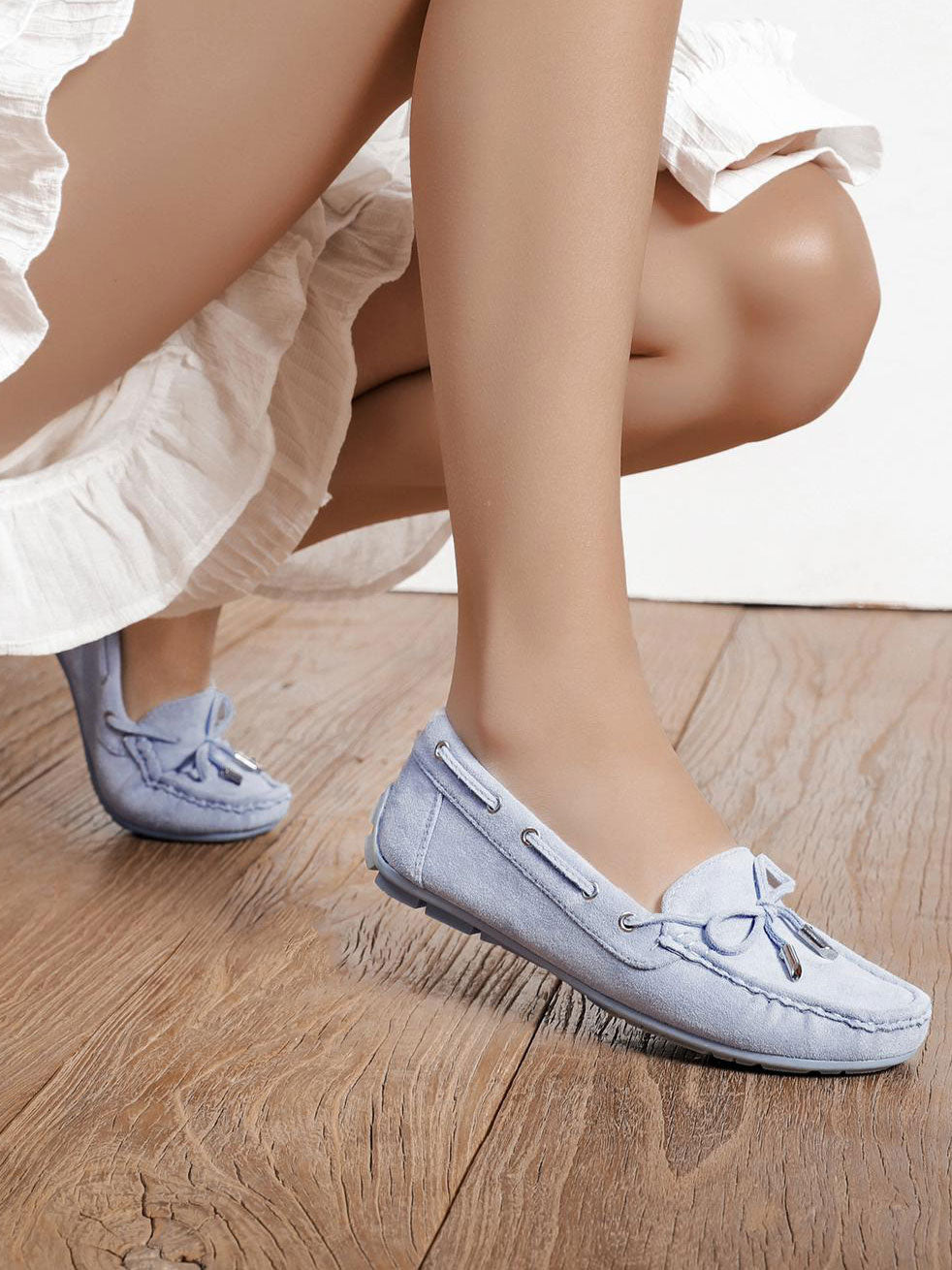 Obi - Söta mockasiner med en liten rosett framtill